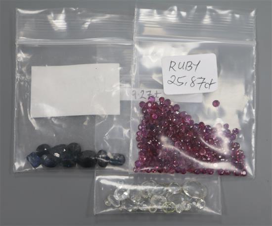 Three small bags of loose unmounted gemstones including rubies.